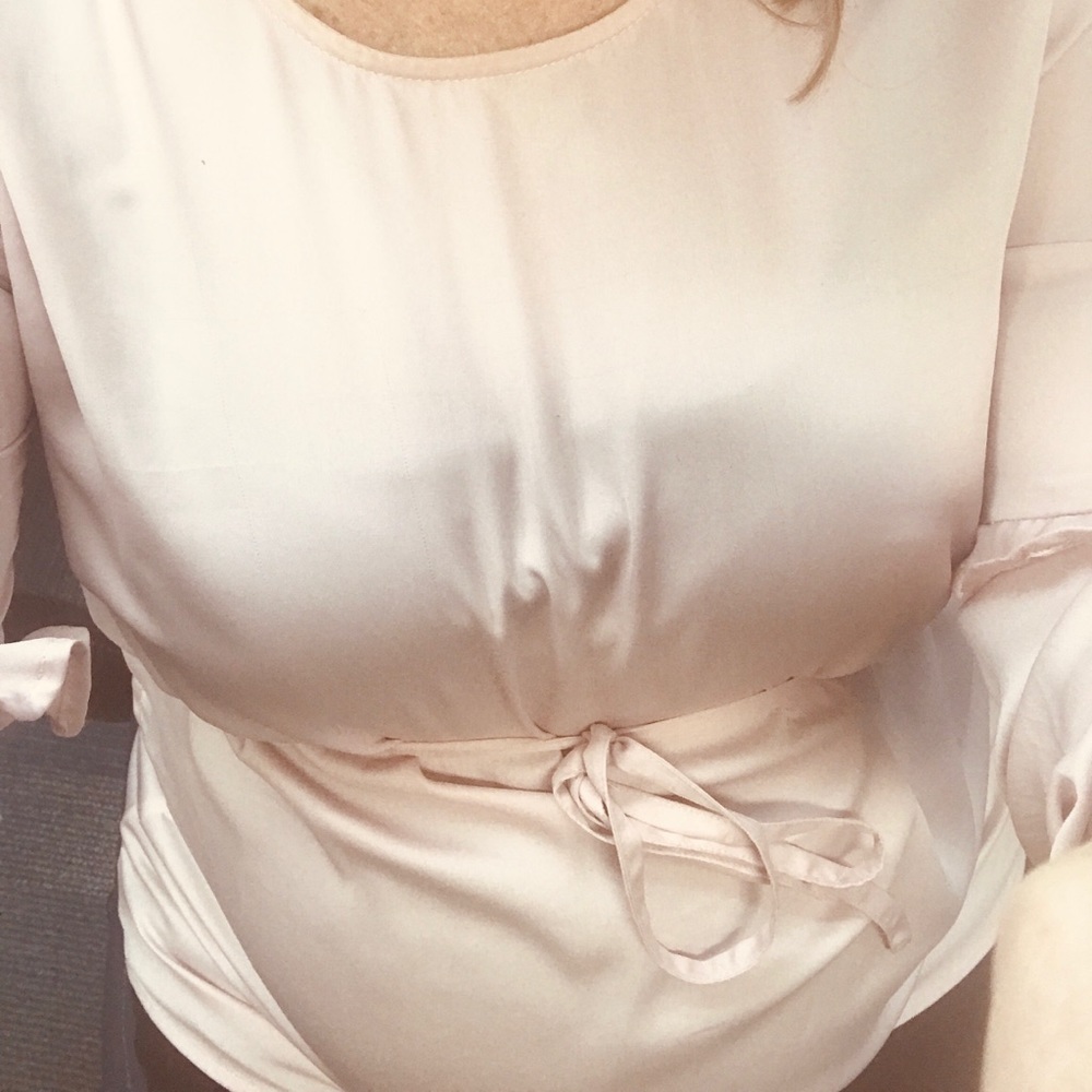 Beautiful maternity blouse in light pink.